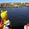 puno-lake-titicaca-boat-women-01-900×500